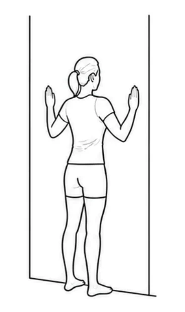 Shoulder wall slide – Stand tall close to the wall with your feet hip-width apart. Place both palms on the wall with your elbows bent.