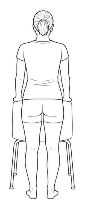 Standing hip abduction – Stand behind the chair with both feet on the floor. Rest both hands lightly on the chair back and look straight ahead.